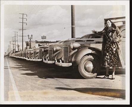 What is believed to be a record for motor cars delivered to separate retail purchasers in a single day was achieved by Angeles Motors, Chrysler and Plymouth dealer of Los Angeles, California, on Christmas day, 1936. On that morning 47 new cars were placed in the hands of owners. They represented 47 distinct buyers, no tow of whom were even in the same family.