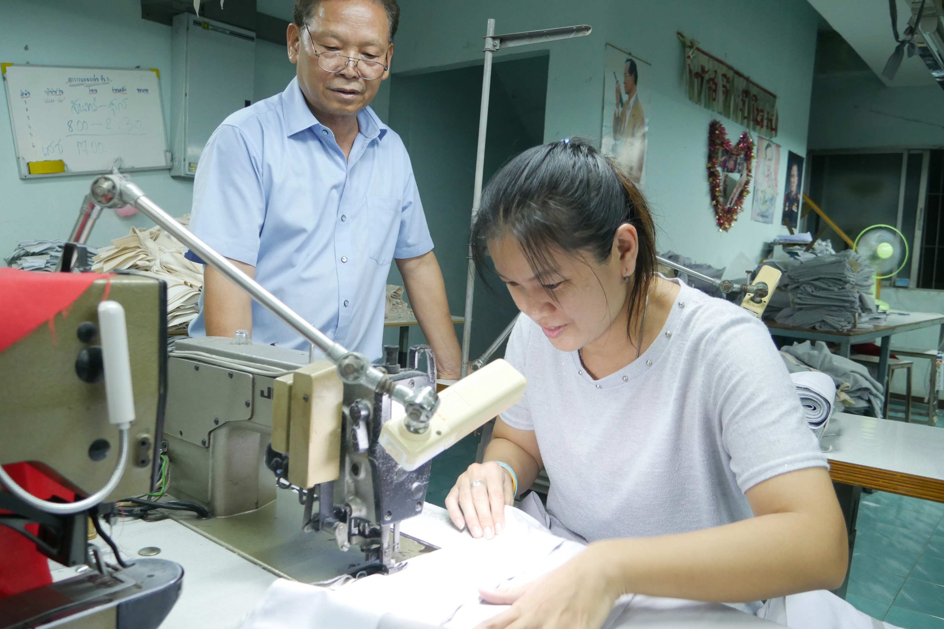Workers in garment factory. (Shutterstock)