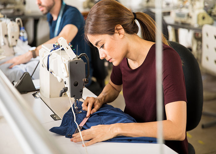 Image of garment factory worker. (Shutterstock)