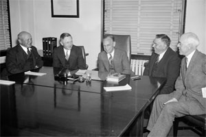 S.E.C. reports to White House. Washington, D.C., April 13, 1937. Library of Congress, Prints & Photographs Division, photograph by Harris & Ewing, LC-DIG-hec-22549.