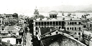 Queen’s Road (Queen’s Road Central) looking west from Battery Path, Central District.  The University of Hong Kong Libraries.