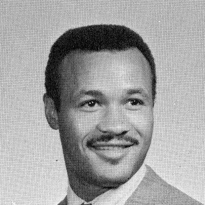 Black and white headshot of Clifford E. Darden.